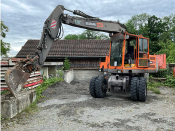 Колёсный экскаватор VOLVO