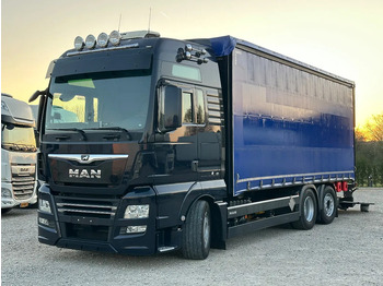 Тентованный грузовик MAN TGX 26.510