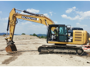 Гусеничный экскаватор CATERPILLAR 320E