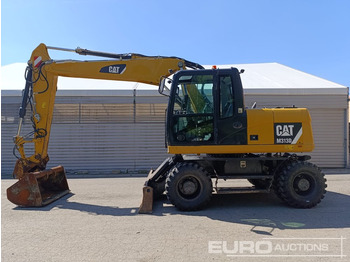 Колёсный экскаватор CATERPILLAR M313D