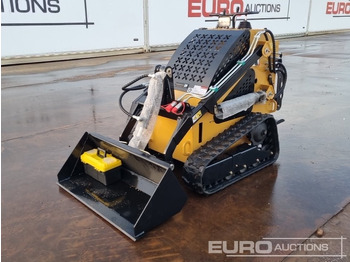 Мини-погрузчик с бортовым поворотом