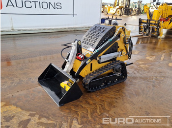 Мини-погрузчик с бортовым поворотом