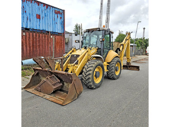 Экскаватор-погрузчик NEW HOLLAND