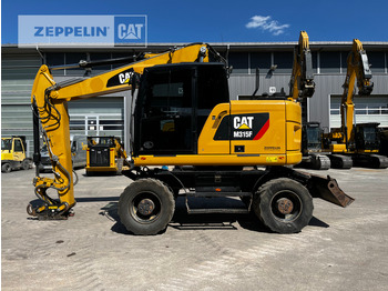 Колёсный экскаватор CATERPILLAR M315F