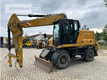 Колёсный экскаватор CATERPILLAR M318