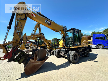 Колёсный экскаватор CATERPILLAR M318
