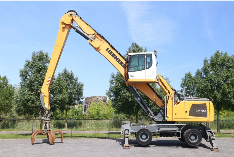 Liebherr LH 40 M LITRONIC | GRAB | QUICK COUPLER | 16 METER - Перегружатель: фото 1 Liebherr LH 40 M LITRONIC | GRAB | QUICK COUPLER | 16 METER - Перегружатель: фото 1