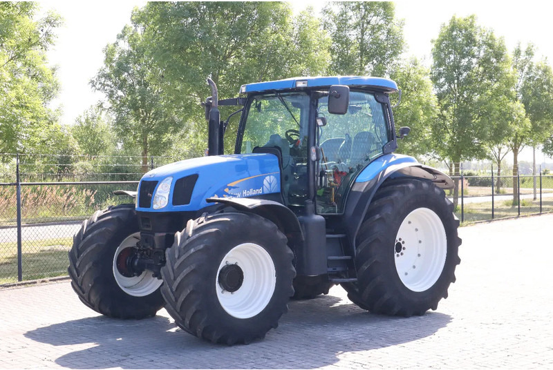 New Holland TS135A | 40 KM/H | 4X4 | SUPERSTEER - Трактор: фото 2 New Holland TS135A | 40 KM/H | 4X4 | SUPERSTEER - Трактор: фото 2
