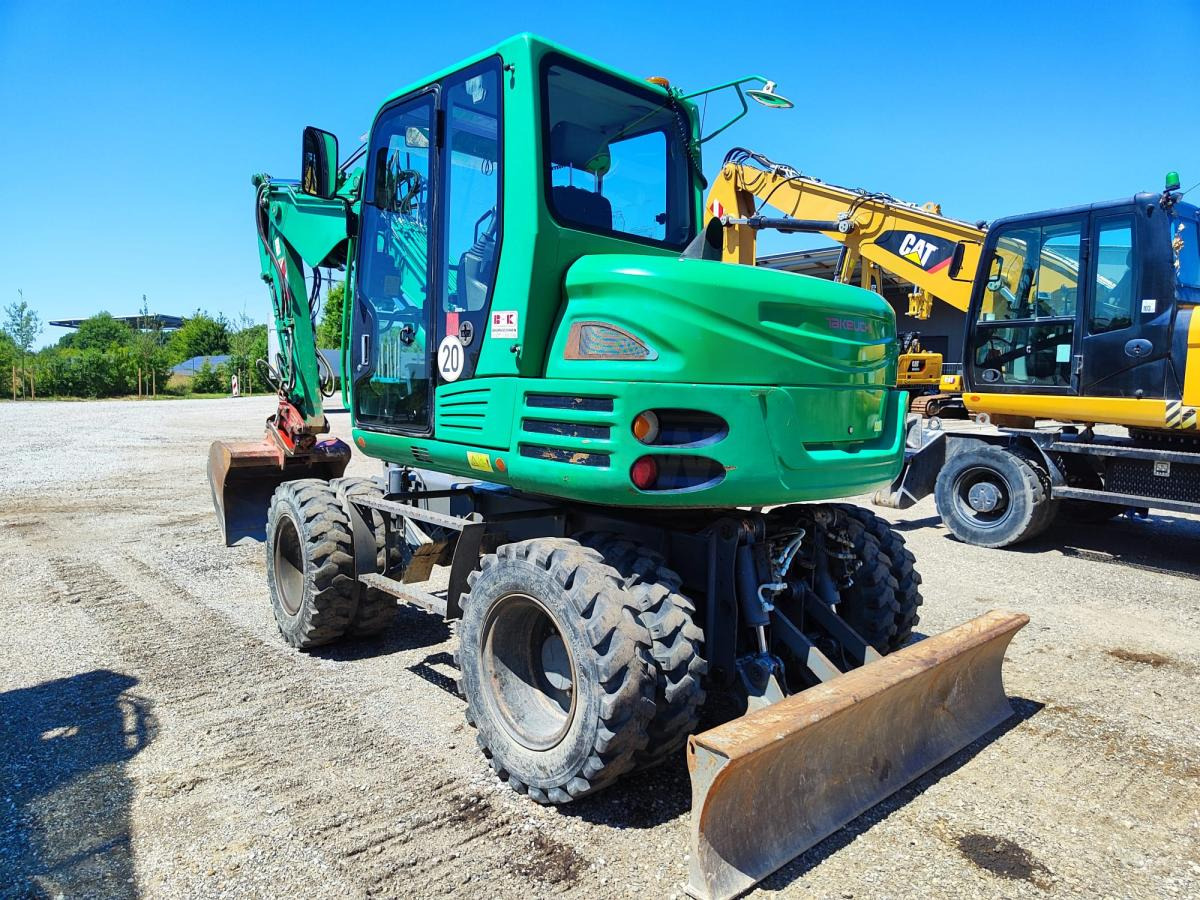 Takeuchi TB295W - Колёсный экскаватор: фото 1 Takeuchi TB295W - Колёсный экскаватор: фото 1