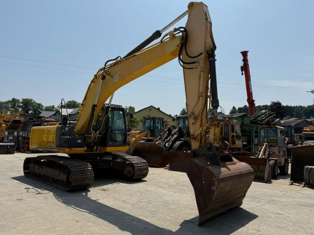 New Holland Kobelco E 215 C - Гусеничный экскаватор: фото 2 New Holland Kobelco E 215 C - Гусеничный экскаватор: фото 2