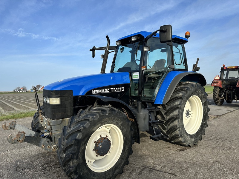 New Holland TM 115 - Трактор: фото 1 New Holland TM 115 - Трактор: фото 1