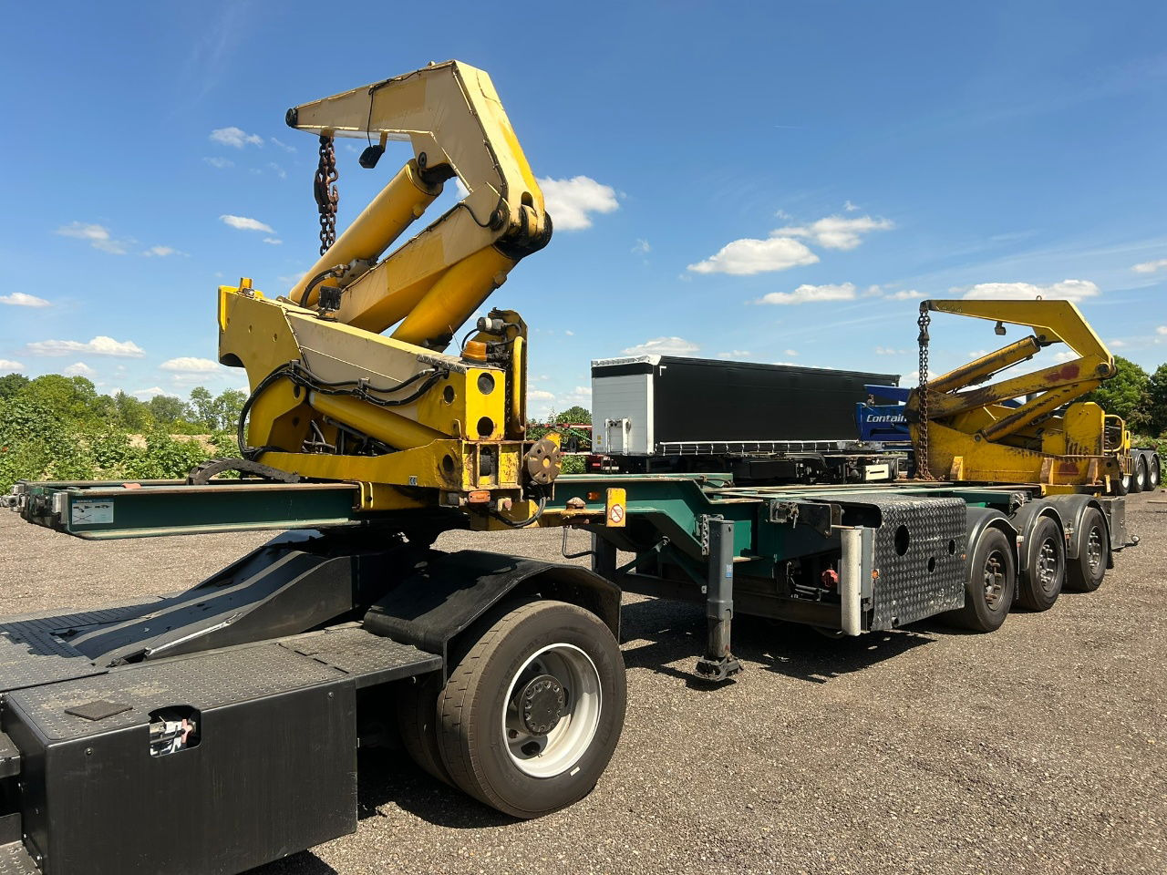 Hammar 195 HC / 20 ft, 2 x 20 ft 40 ft HC, power pack Diesel, Wireless controller 2 x, telescopic chassis - Полуприцеп-контейнеровоз/ Сменный кузов: фото 1 Hammar 195 HC / 20 ft, 2 x 20 ft 40 ft HC, power pack Diesel, Wireless controller 2 x, telescopic chassis - Полуприцеп-контейнеровоз/ Сменный кузов: фото 1