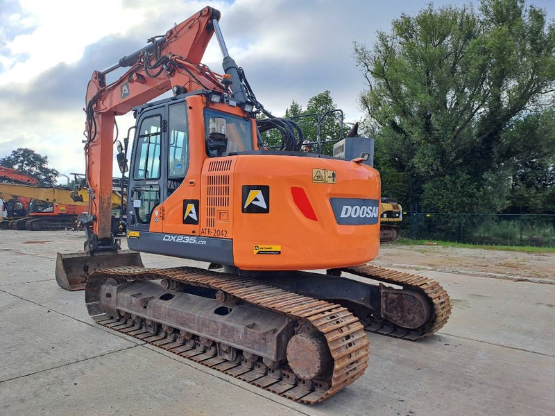 Doosan DX235LCR-5 - Гусеничный экскаватор: фото 2 Doosan DX235LCR-5 - Гусеничный экскаватор: фото 2