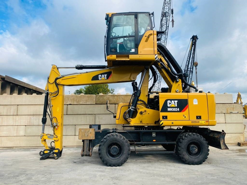 CAT mh3024  - Перегружатель: фото 1 CAT mh3024  - Перегружатель: фото 1