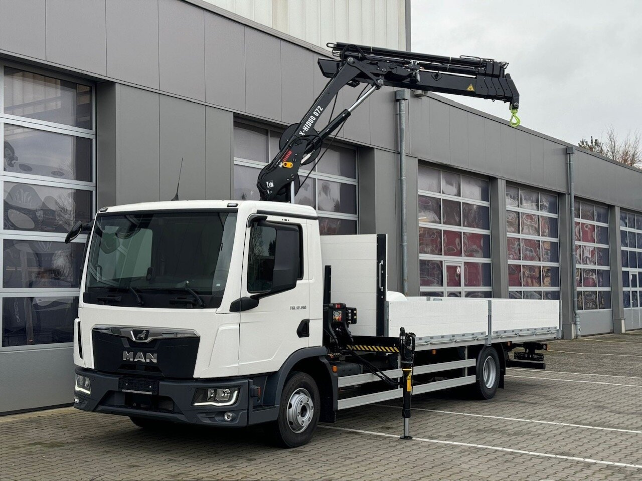 MAN TGL 12.190 4x2 BL TGL 12.190 4x2 BL mit Kran Hiab Hiduo 072DS-4 - Автоманипулятор: фото 1 MAN TGL 12.190 4x2 BL TGL 12.190 4x2 BL mit Kran Hiab Hiduo 072DS-4 - Автоманипулятор: фото 1