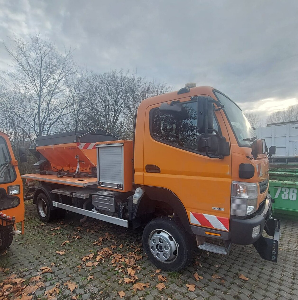 Mitsubishi Canter Fuso 6C18 4x4 Canter Fuso 6C18 4x4, Winterdienstausstattung, City-Abroller - Крюковой мультилифт: фото 1 Mitsubishi Canter Fuso 6C18 4x4 Canter Fuso 6C18 4x4, Winterdienstausstattung, City-Abroller - Крюковой мультилифт: фото 1