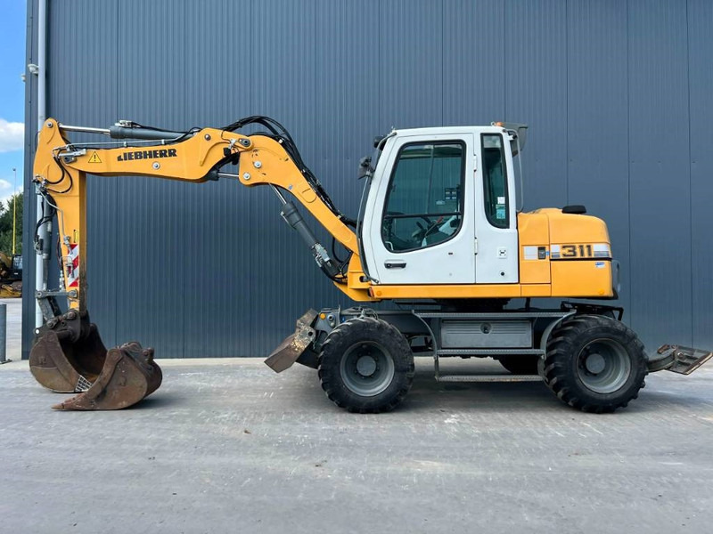 Liebherr A311 Litronic - Колёсный экскаватор: фото 5 Liebherr A311 Litronic - Колёсный экскаватор: фото 5