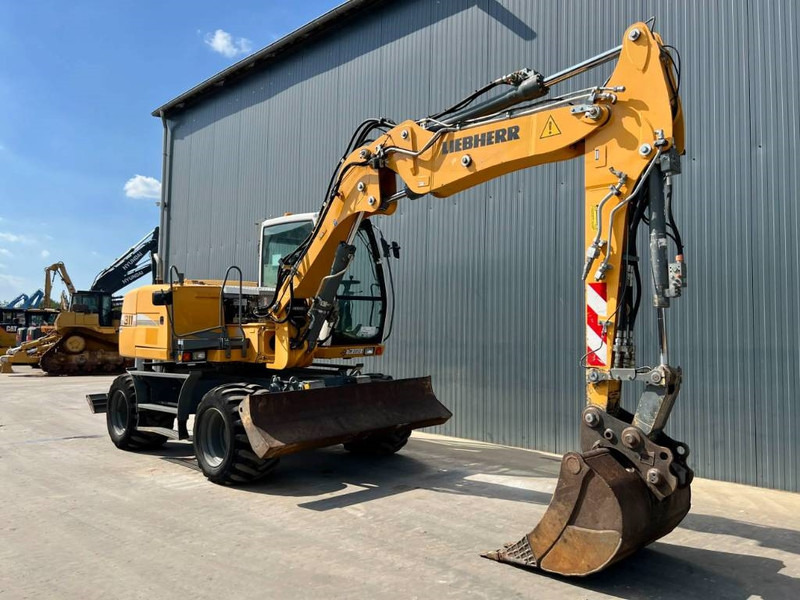 Liebherr A311 Litronic - Колёсный экскаватор: фото 3 Liebherr A311 Litronic - Колёсный экскаватор: фото 3