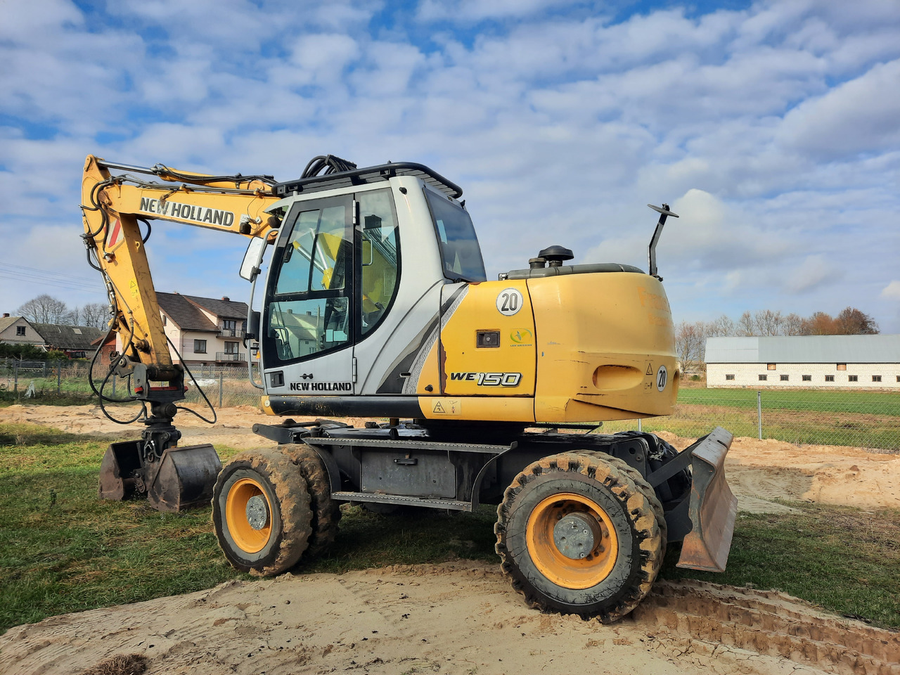 NEW HOLLAND WE150C - Колёсный экскаватор: фото 3 NEW HOLLAND WE150C - Колёсный экскаватор: фото 3
