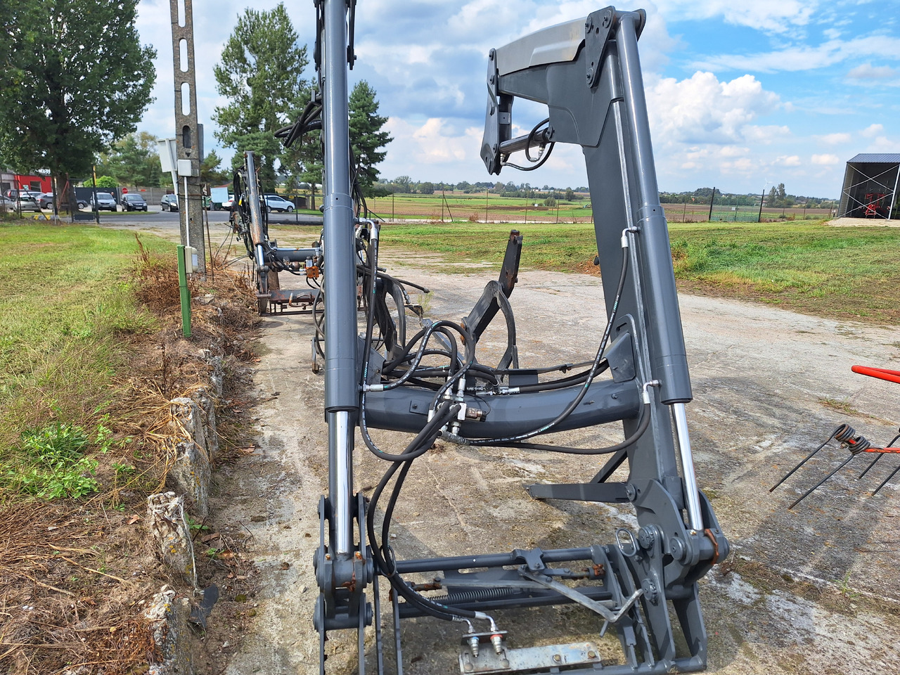 Quicke Q55 - Фронтальный погрузчик для трактора: фото 1 Quicke Q55 - Фронтальный погрузчик для трактора: фото 1