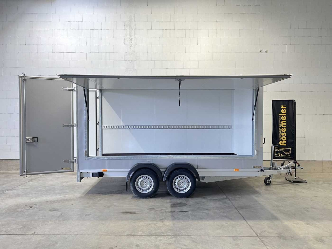 VEZEKO TK D 27.40 Flügeltüren+Seitenk Kofferanhänger Promotionanhänger - Прицеп-фургон: фото 1 VEZEKO TK D 27.40 Flügeltüren+Seitenk Kofferanhänger Promotionanhänger - Прицеп-фургон: фото 1