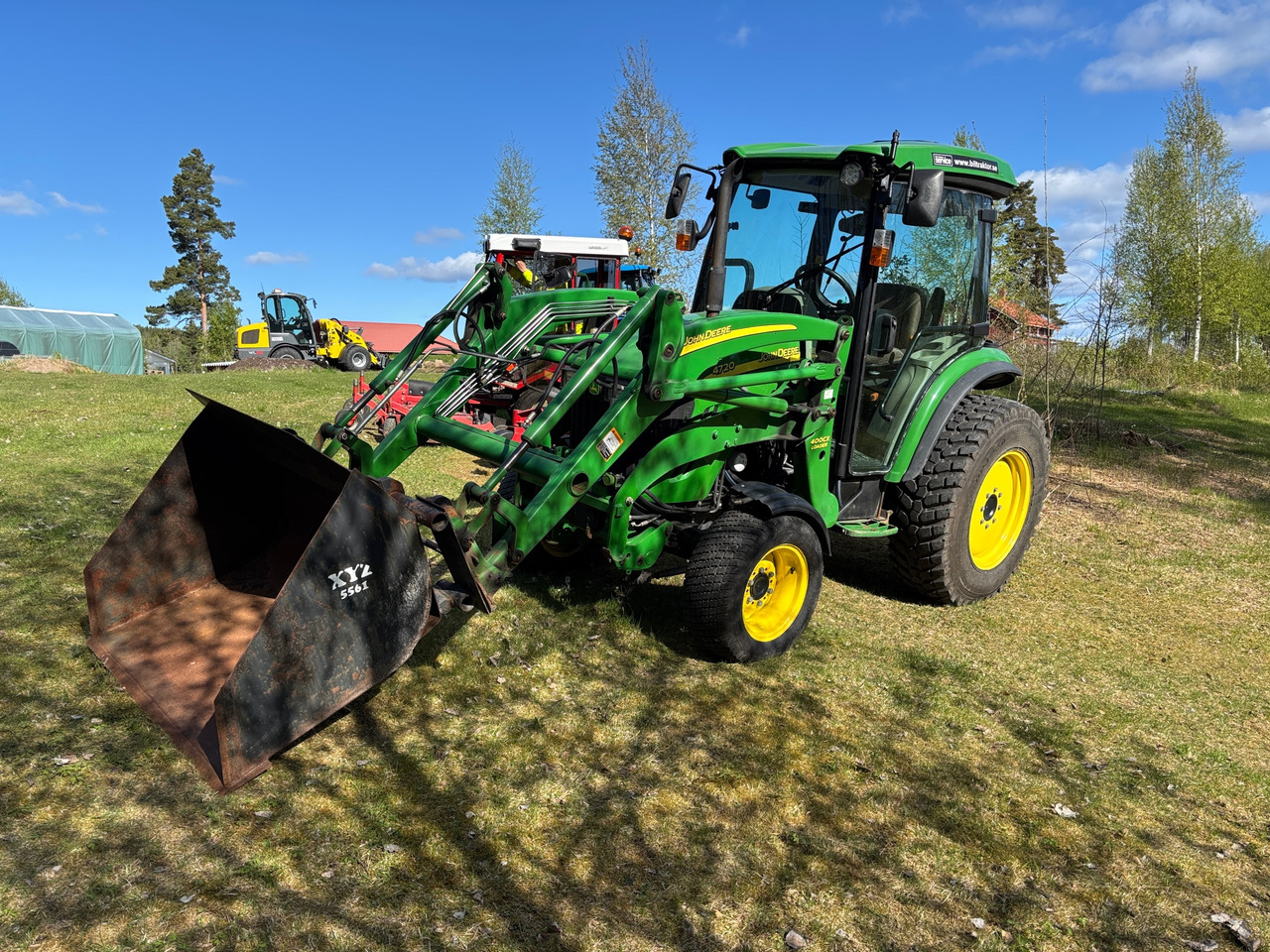 John Deere 4720 - Трактор: фото 1 John Deere 4720 - Трактор: фото 1