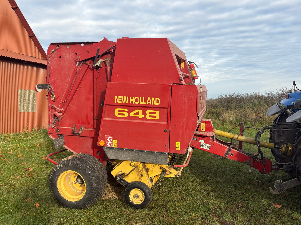 New Holland 648 - Пресс-подборщик рулонный: фото 1 New Holland 648 - Пресс-подборщик рулонный: фото 1