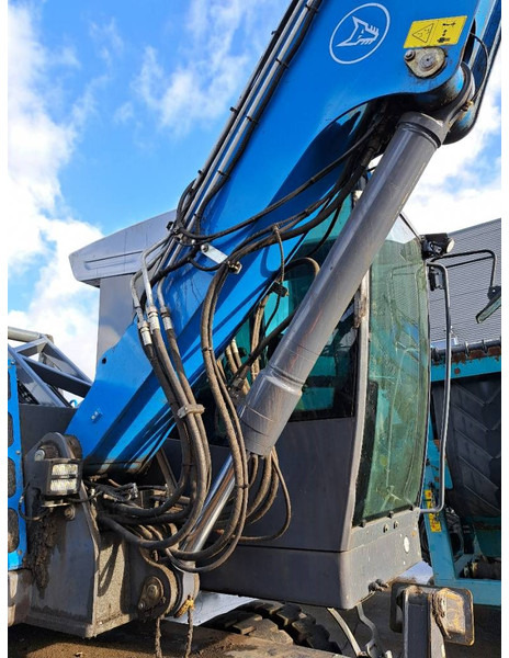 Перегружатель для транспортировки мусора Fuchs MHL 310: фото 18 Перегружатель для транспортировки мусора Fuchs MHL 310: фото 18