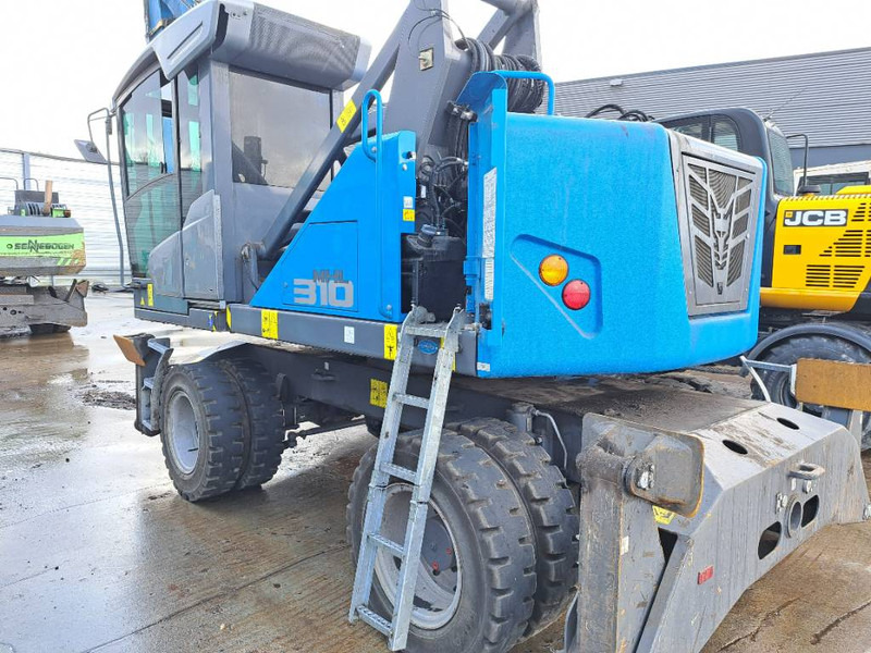 Перегружатель для транспортировки мусора Fuchs MHL310F + Grapple: фото 6