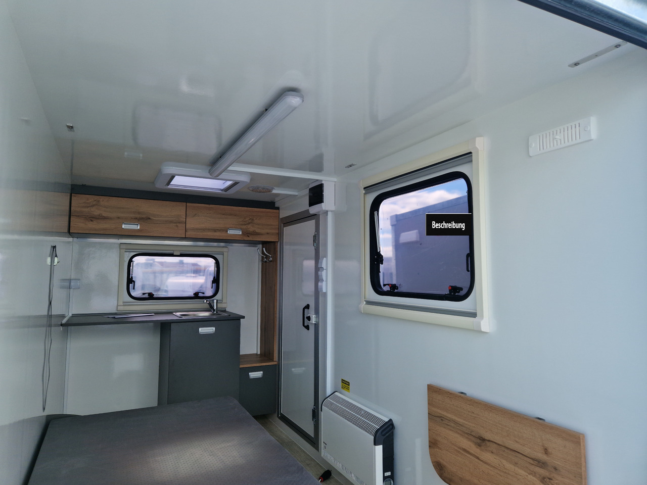 Koffer Camp TFS ST 320.01 320x150x180cm Premium Rampe Seitentür Fenster Bett 1300kg 100km/H - Прицеп дача: фото 5 Koffer Camp TFS ST 320.01 320x150x180cm Premium Rampe Seitentür Fenster Bett 1300kg 100km/H - Прицеп дача: фото 5
