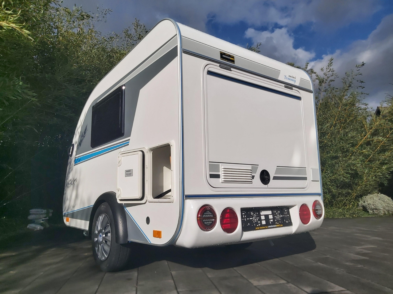 Прицеп дача Mini Camper Mini Tommy TMC25 252x140x121cm aero V1 Küche 12V/230V 100km/H 750kg gebremst Modell 24: фото 8