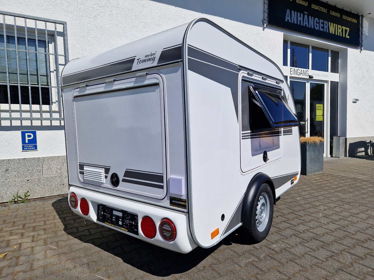 Прицеп дача Mini Camper Mini Tommy TMC25 252x140x121cm aero V1 Küche 12V/230V 100km/H 750kg gebremst Modell 24: фото 19