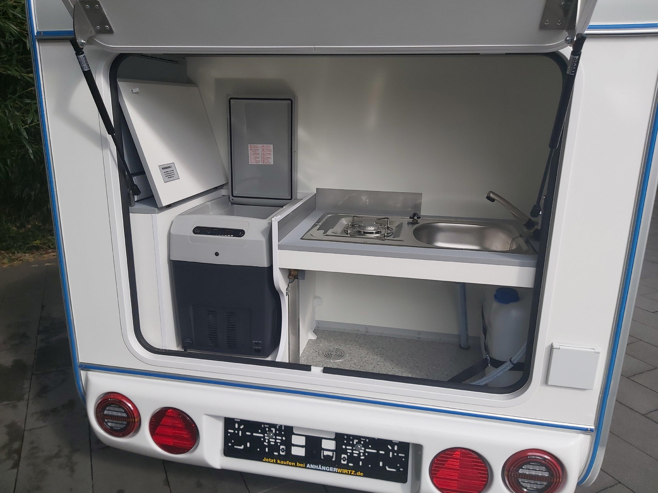 Прицеп дача Mini Camper Mini Tommy TMC25 252x140x121cm aero V1 Küche 12V/230V 100km/H 750kg gebremst Modell 24: фото 6