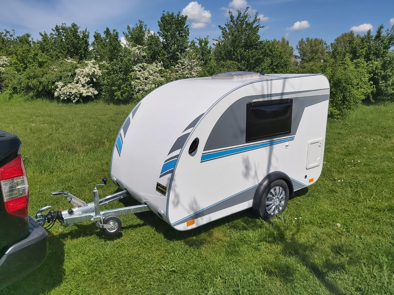 Прицеп дача Mini Camper Mini Tommy TMC25 252x140x121cm aero V1 Küche 12V/230V 100km/H 750kg gebremst Modell 24: фото 14