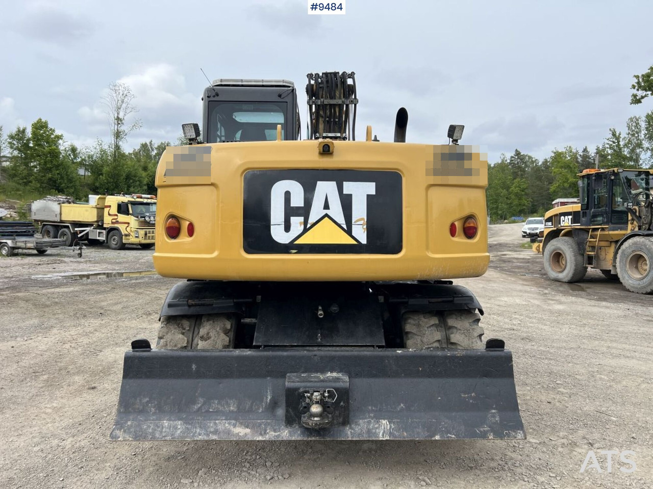 Колёсный экскаватор CAT M313D with tipping wagon and attachments (VIDEO): фото 9