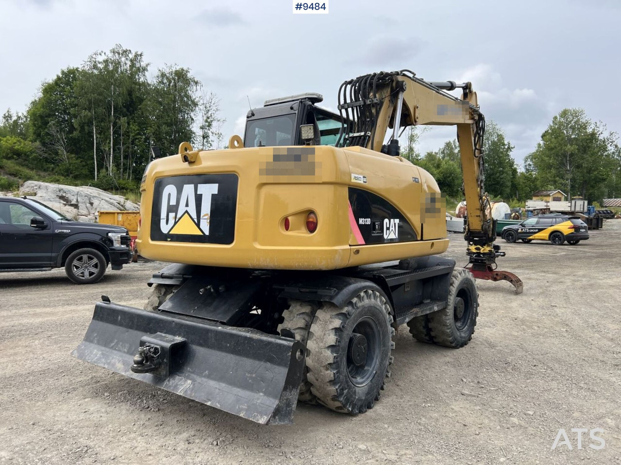 Колёсный экскаватор CAT M313D with tipping wagon and attachments (VIDEO): фото 10
