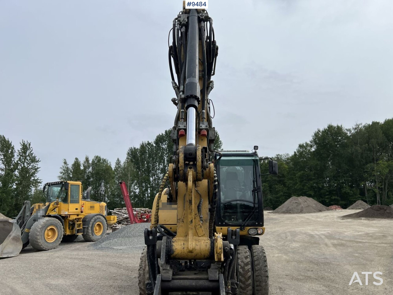 Колёсный экскаватор CAT M313D with tipping wagon and attachments (VIDEO): фото 19