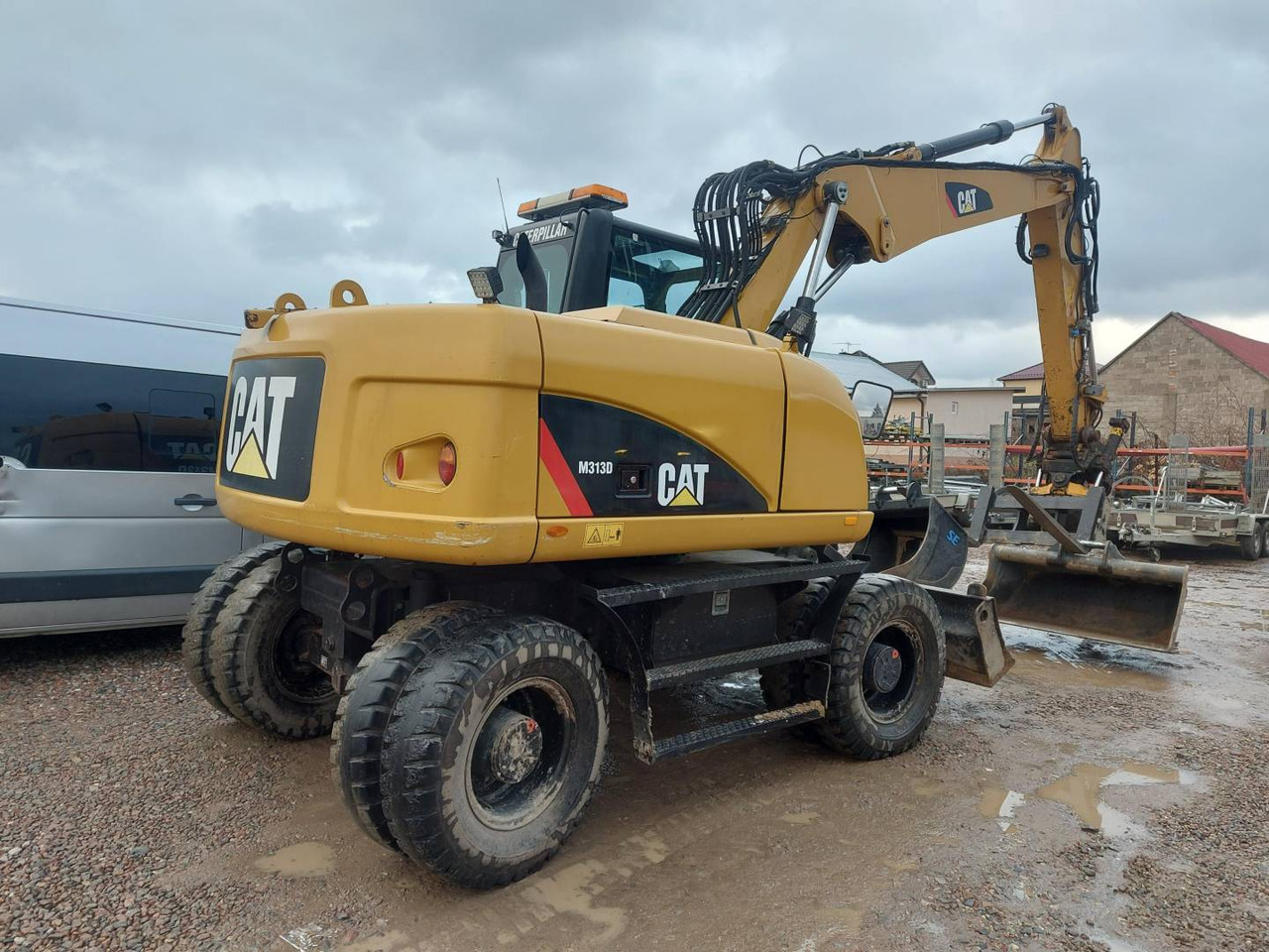 CAT M313D - Колёсный экскаватор: фото 3 CAT M313D - Колёсный экскаватор: фото 3