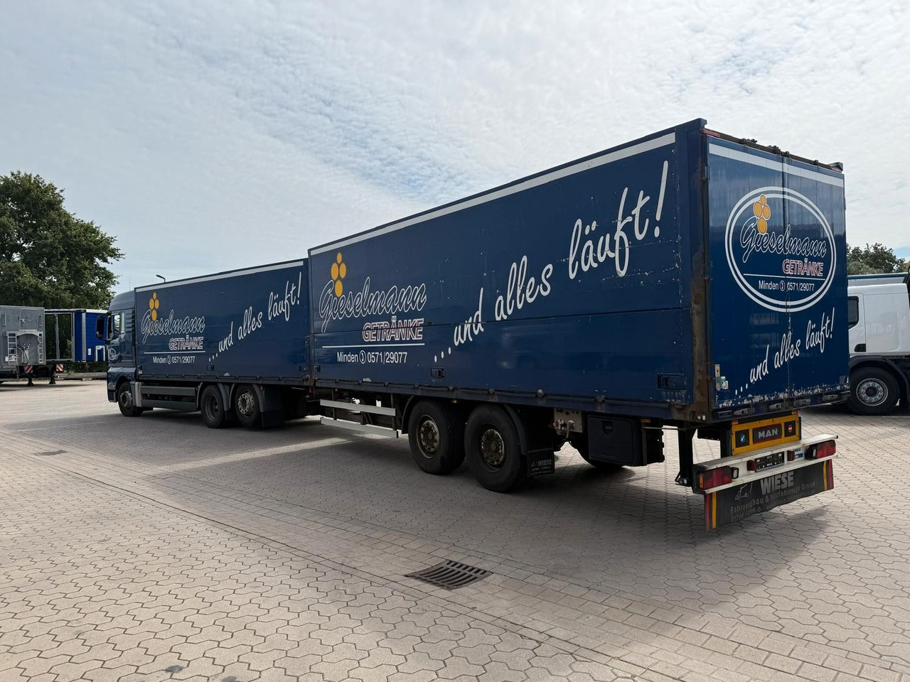 MAN TGA Schwenkwand-Getränkeaufbau incl. Anhänger - Грузовик для перевозки напитков: фото 4 MAN TGA Schwenkwand-Getränkeaufbau incl. Anhänger - Грузовик для перевозки напитков: фото 4