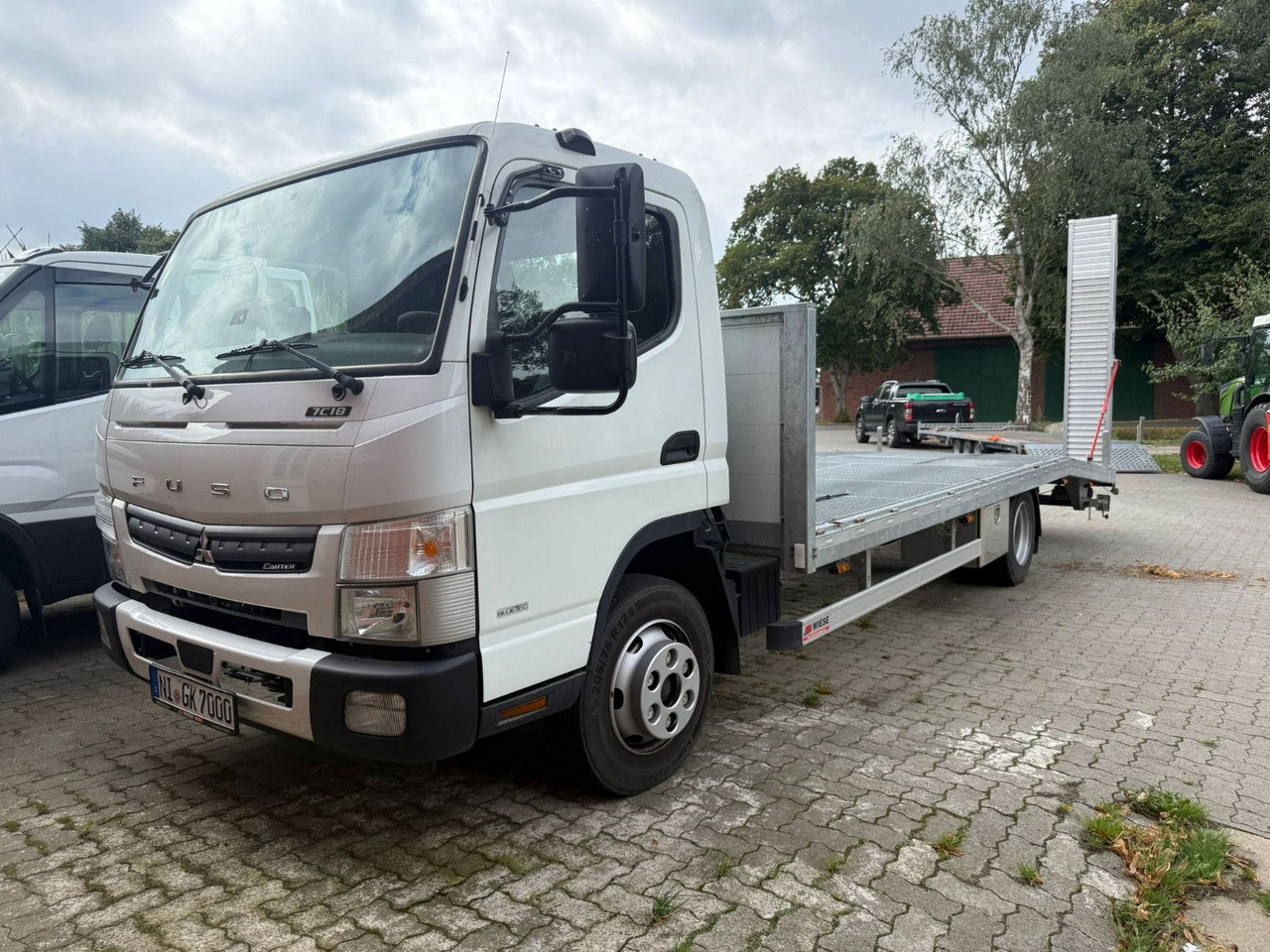 Mitsubishi Fuso Canter 7C18 Arbeitsbühnentransporter - Малотоннажный бортовой грузовик: фото 1 Mitsubishi Fuso Canter 7C18 Arbeitsbühnentransporter - Малотоннажный бортовой грузовик: фото 1
