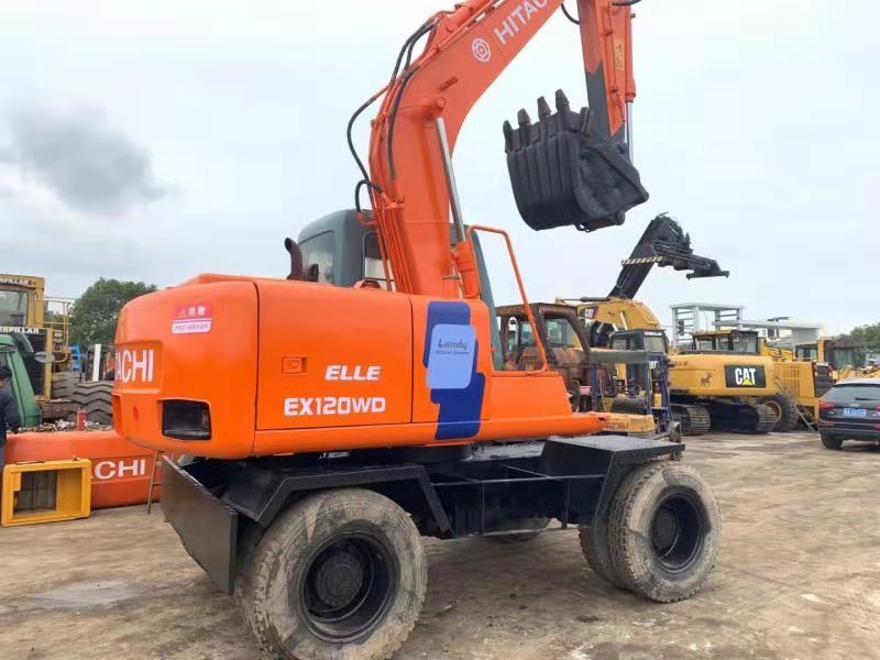 HITACHI EX120WD - Колёсный экскаватор: фото 1 HITACHI EX120WD - Колёсный экскаватор: фото 1