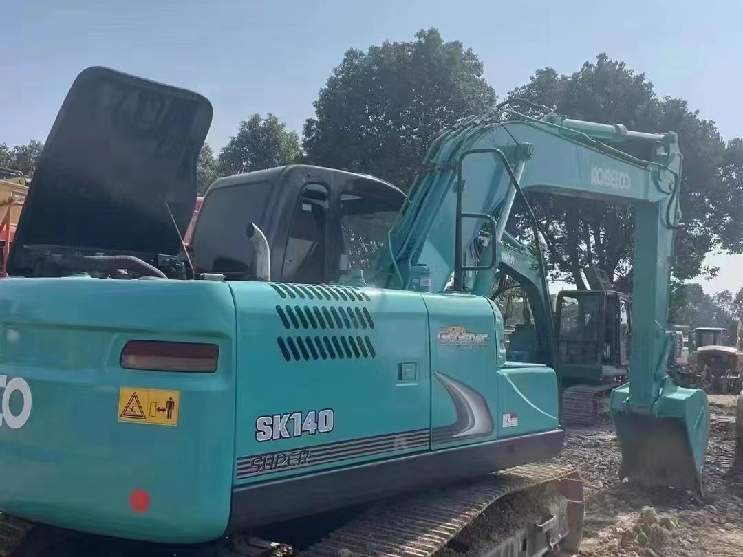 KOBELCO SK140 - Гусеничный экскаватор: фото 1 KOBELCO SK140 - Гусеничный экскаватор: фото 1