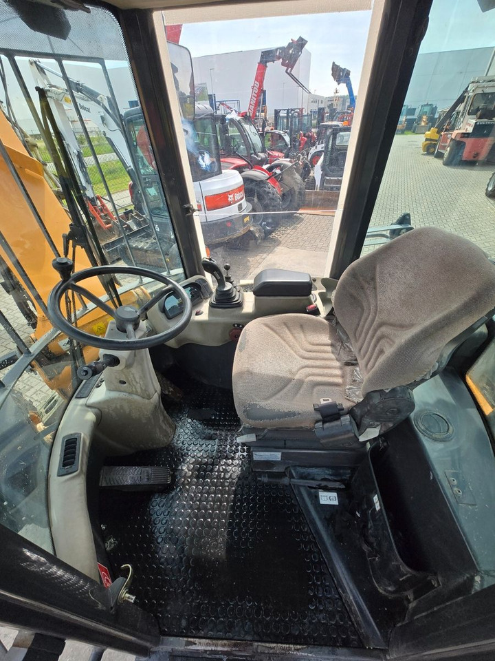 Колёсный погрузчик Case 21E: фото 11 Колёсный погрузчик Case 21E: фото 11