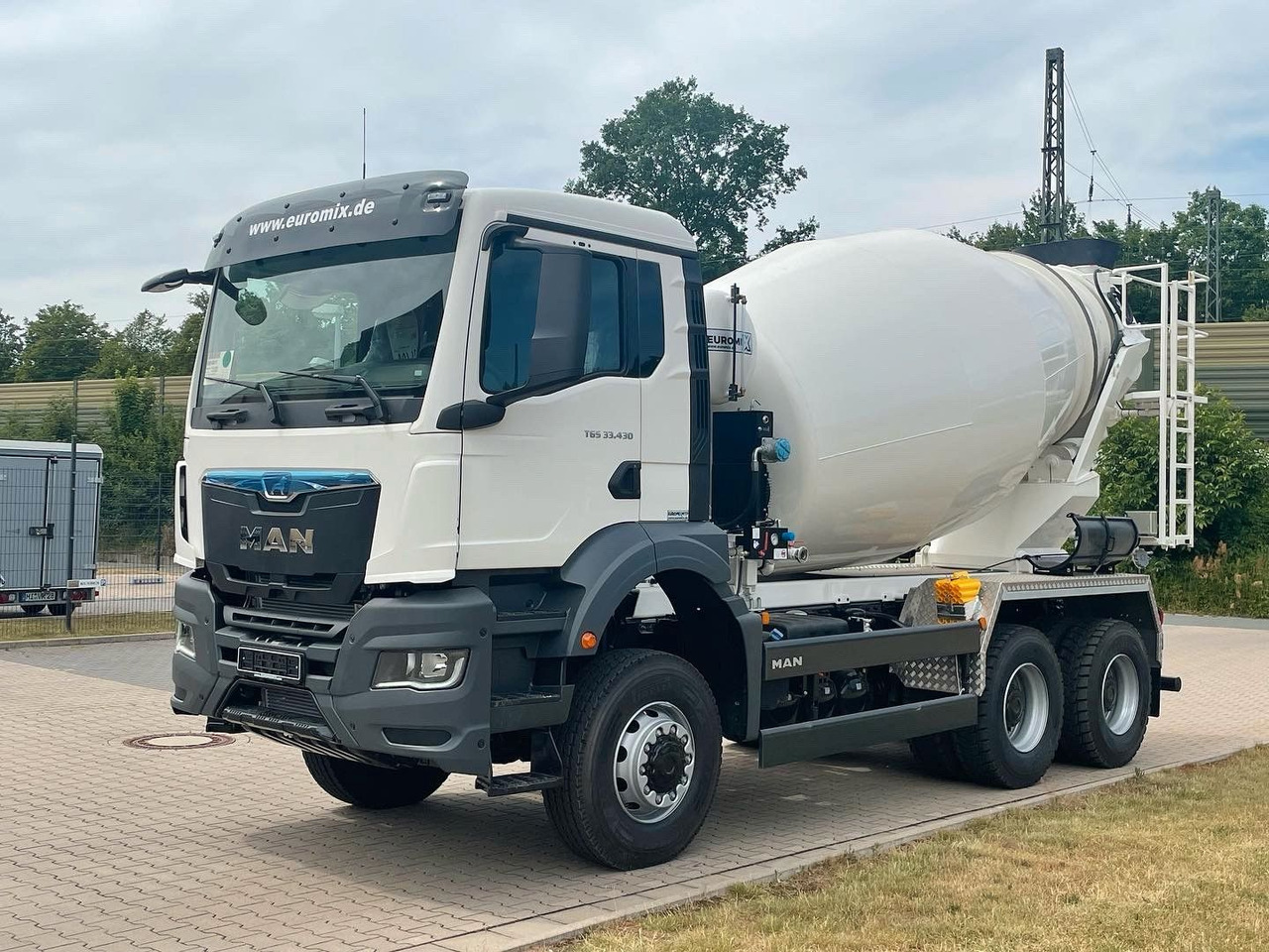 MAN TGS 33.440 / 6X6 Euro6e Euromix MTP EM 7 L - Автобетоносмеситель: фото 2 MAN TGS 33.440 / 6X6 Euro6e Euromix MTP EM 7 L - Автобетоносмеситель: фото 2