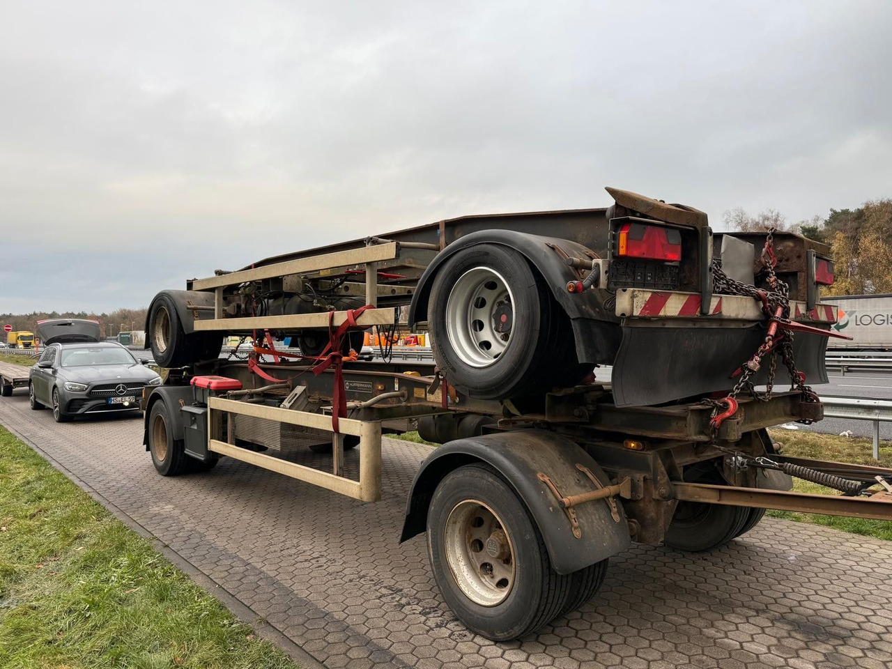 Hüffermann HSA 18.70 Schlittenabroller Containeranhänger 2x - Прицеп мультилифт/ Бункеровоз: фото 1 Hüffermann HSA 18.70 Schlittenabroller Containeranhänger 2x - Прицеп мультилифт/ Бункеровоз: фото 1