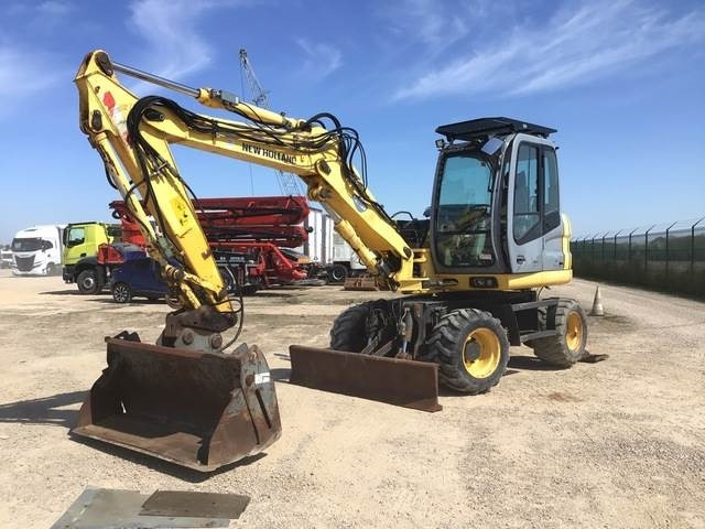 New Holland MH2.6 - Колёсный экскаватор: фото 1 New Holland MH2.6 - Колёсный экскаватор: фото 1
