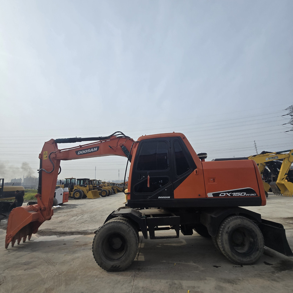 DOOSAN DX150W - Колёсный экскаватор: фото 2 DOOSAN DX150W - Колёсный экскаватор: фото 2