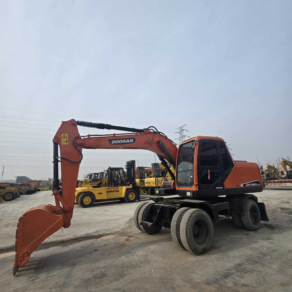 DOOSAN DX150W - Колёсный экскаватор: фото 3 DOOSAN DX150W - Колёсный экскаватор: фото 3