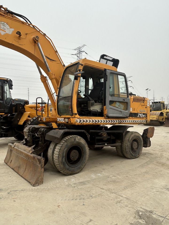 HYUNDAI R210W - Колёсный экскаватор: фото 5 HYUNDAI R210W - Колёсный экскаватор: фото 5