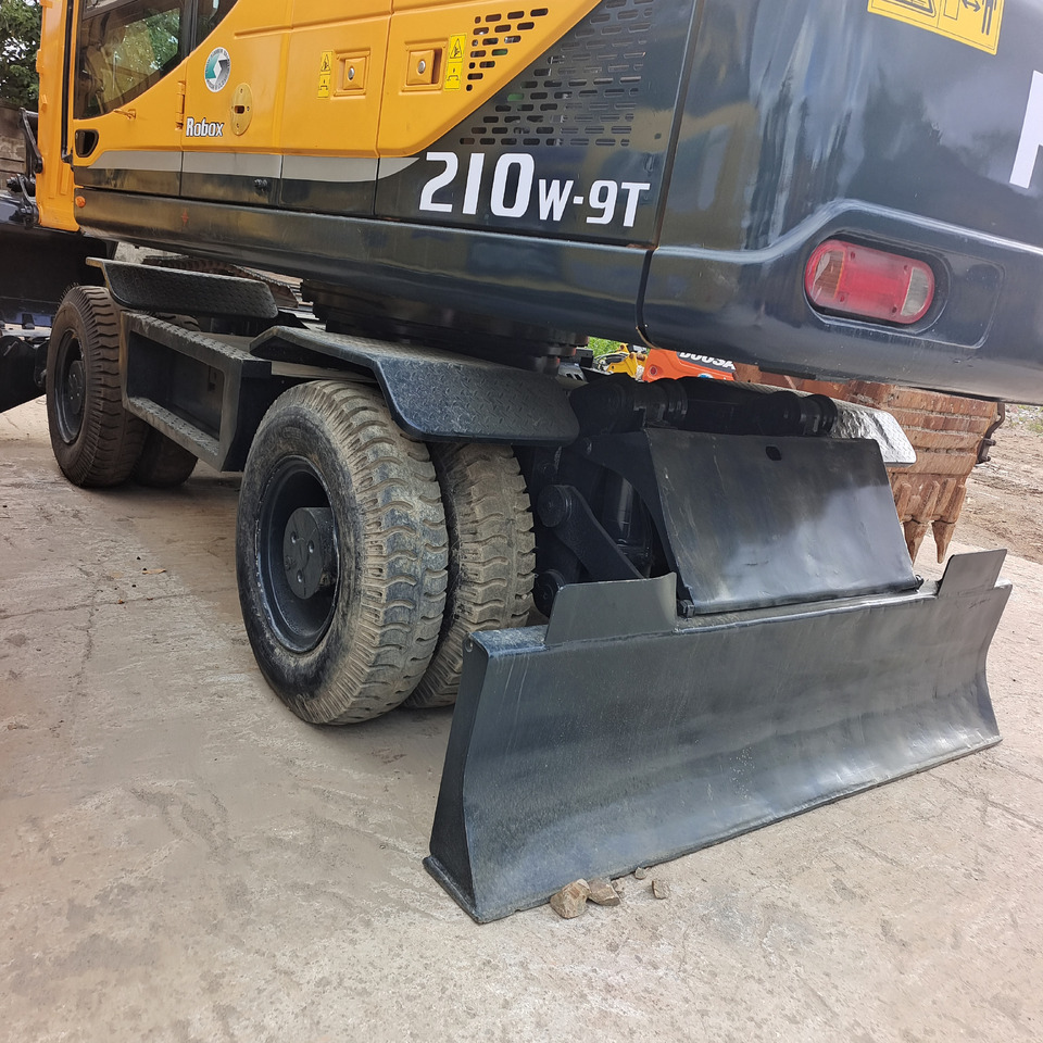 HYUNDAI 210W-9 - Колёсный экскаватор: фото 4 HYUNDAI 210W-9 - Колёсный экскаватор: фото 4